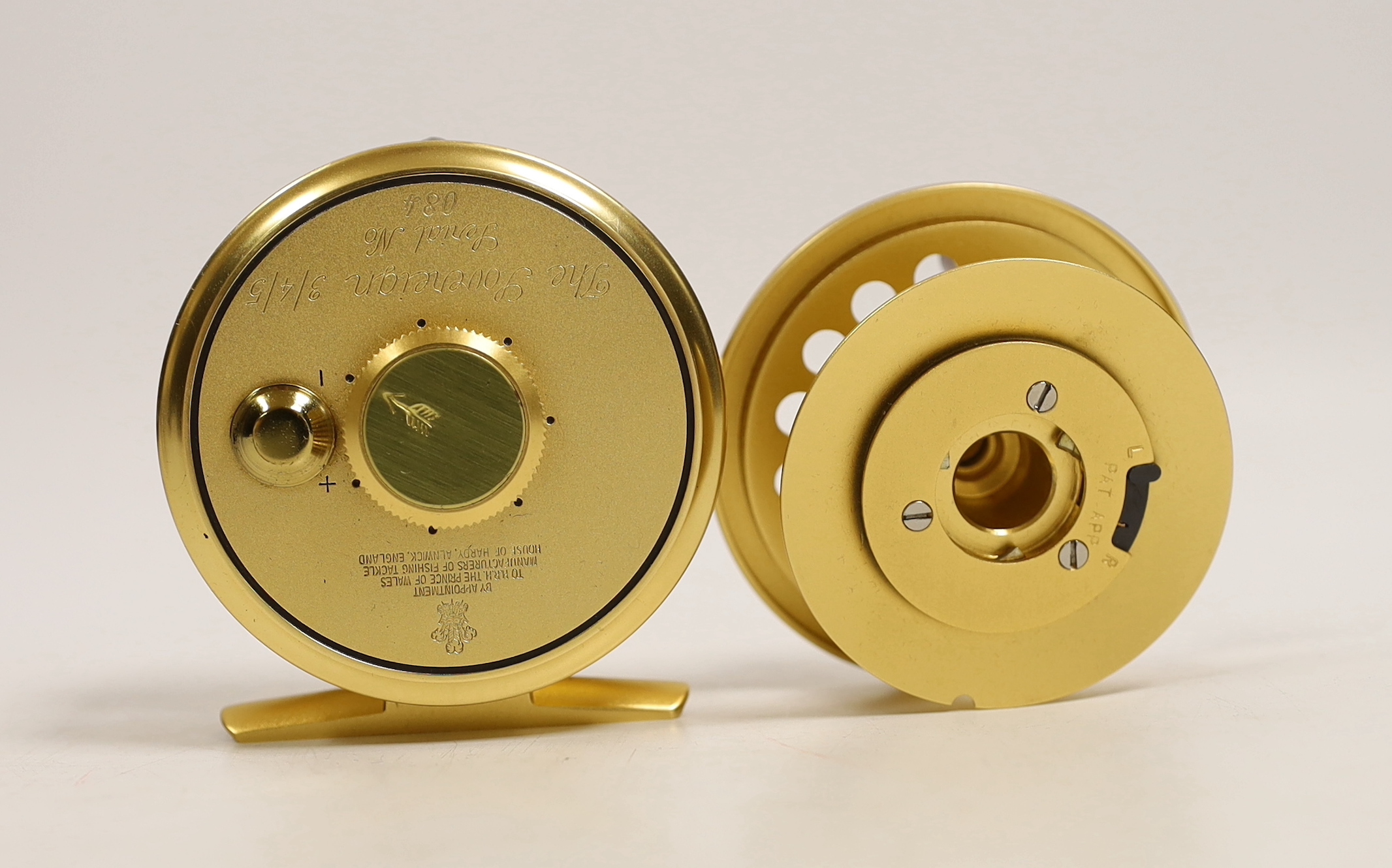 A House of Hardy Sovereign 3/4/5 centre pin fly reel, Serial Number 084 with spare spool, reel with sheepskin lined soft case (2)